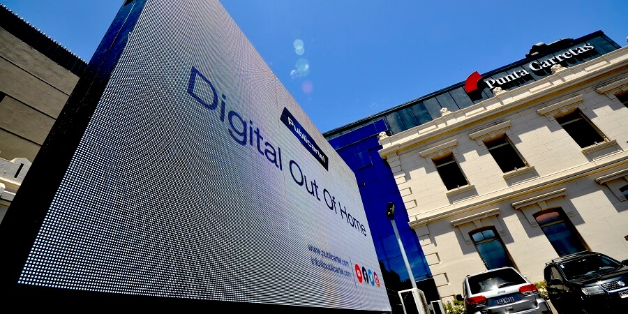A Publicartel ad that says "Digital out-of-home" on a digital display