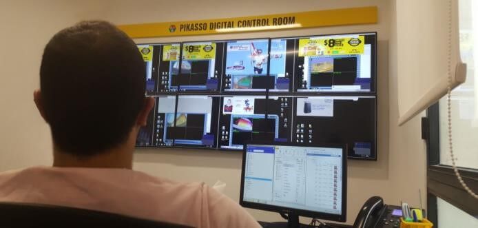 Shows Pikasso's digital control room, where all of its displays are managed centrally.